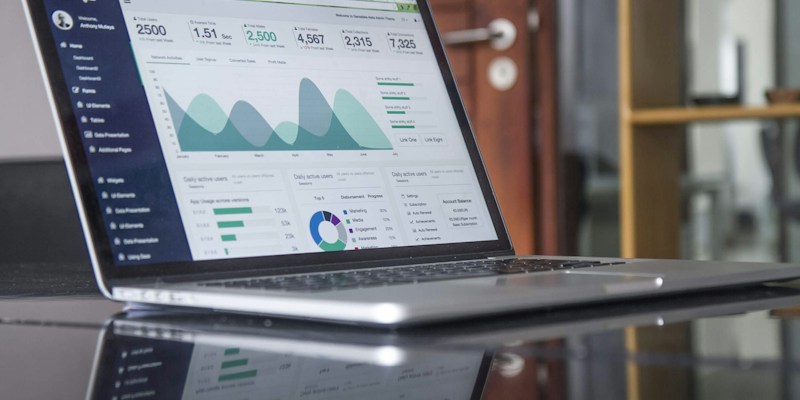 Digital workflow and marketing metrics on a laptop screen